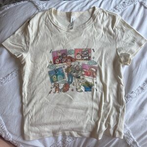 Disney - Bella Canvas Cream Short Sleeve Tee with Graphic Print